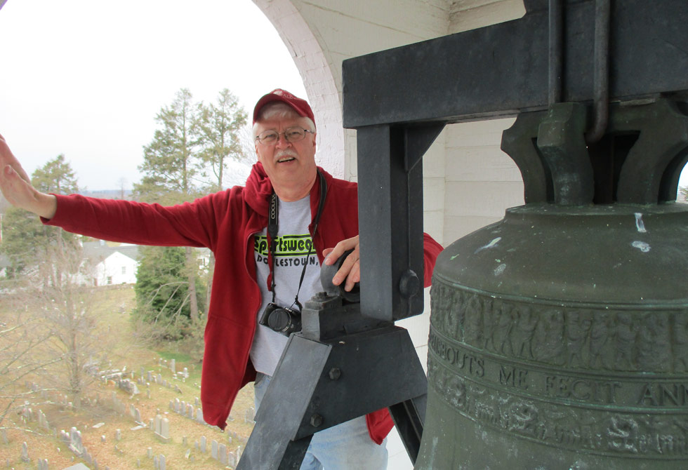 Pastor Loring in the bell tower of the Baptist Church in the Great Valley