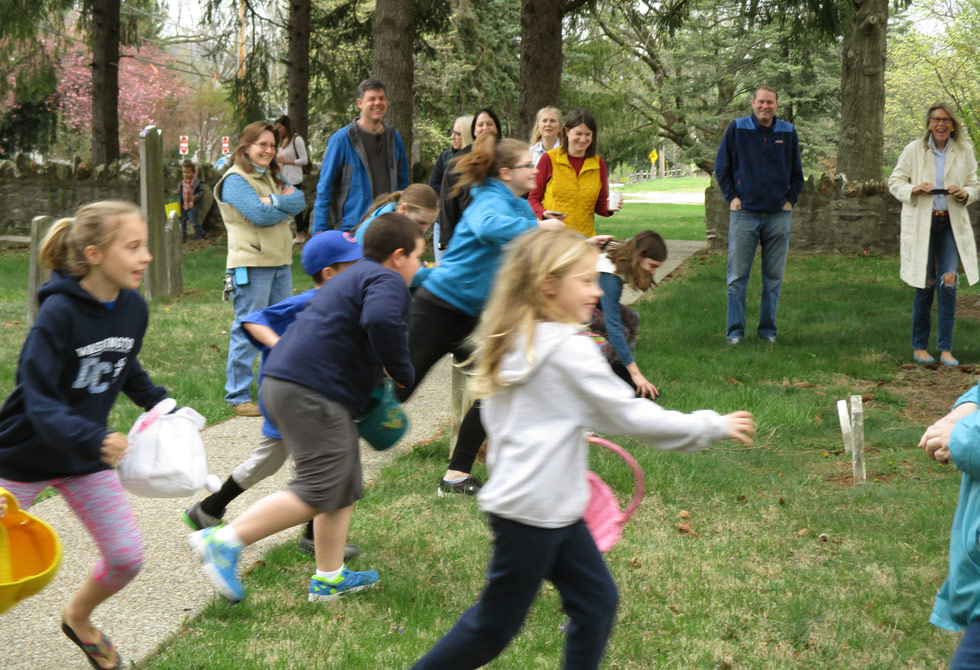 Children on an Easter egg hunt in the BCGV cemetery