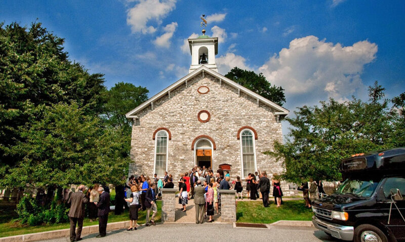 People attending a wedding at the Baptist Church in the Great Valley
