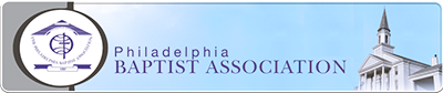 Philadelphia Baptist Church Logo - Purple serif type with globe and cross icon to left