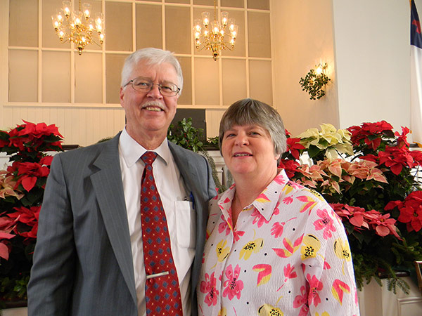 Pastor John Loring with his wife, Kim Loring, at Christmas