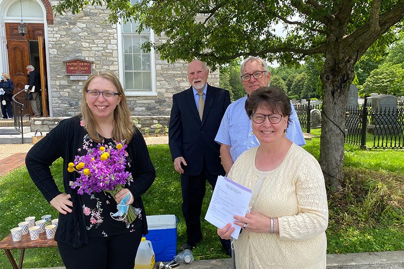 Church members outside the church after services