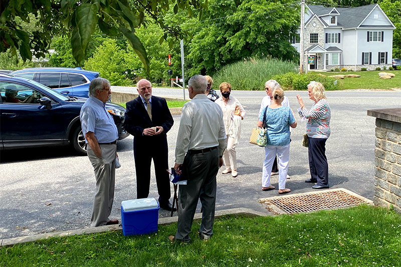 Church members outside the church after services