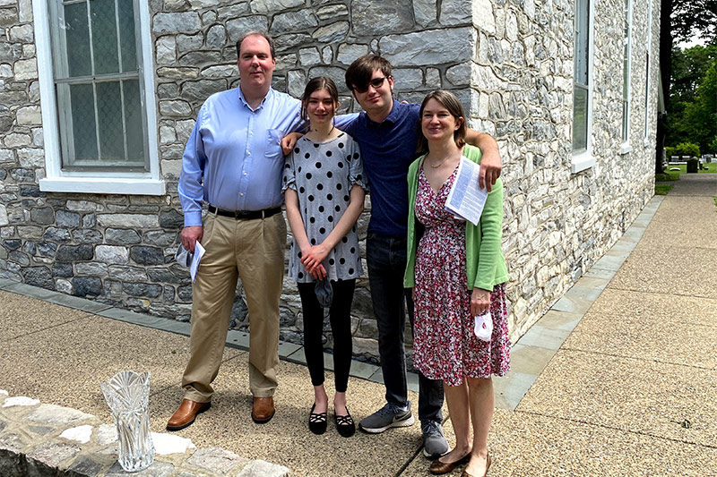 Church members outside the church after services