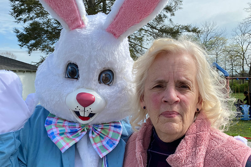 Photo of a woman with the Easter Bunny