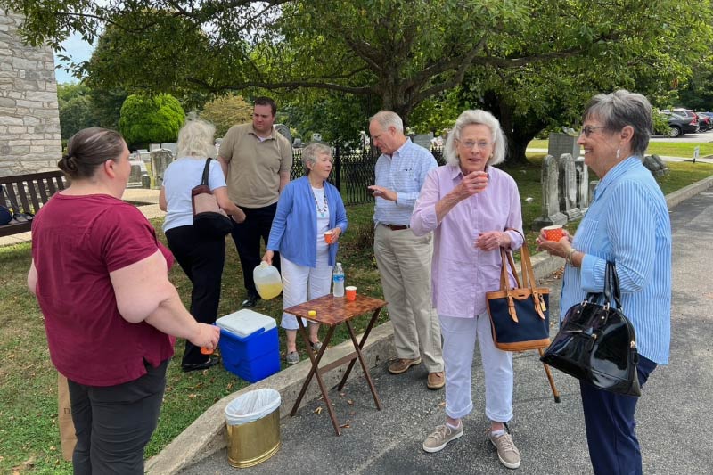 Photo of church members drinking lemonade outside