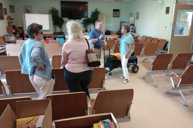 Photo of people delivering backpacks