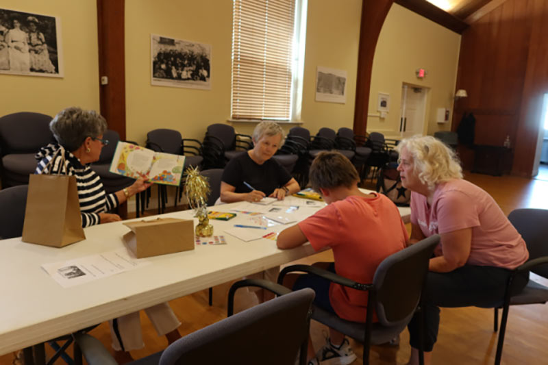 Photo of kids doing arts and crafts