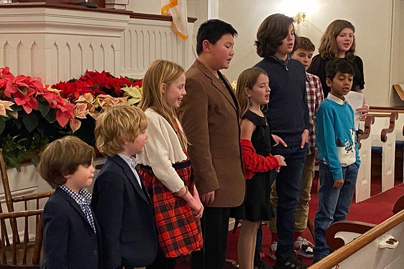 Children singing at the Christmas eve service