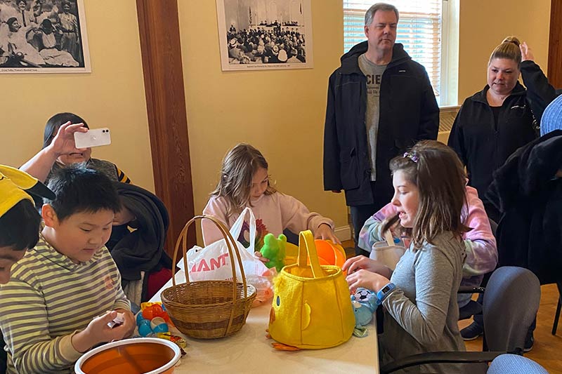 Photo of kids with their Easter baskets