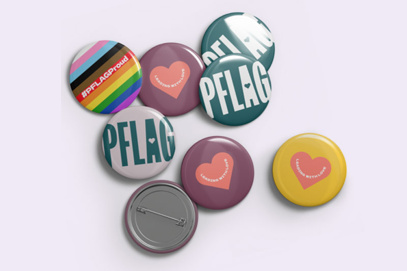 Photo of round PFLAG LGBTQ pins