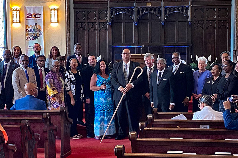 Photo of people at the celebration of the Dr. Quintin L. Robertson installation